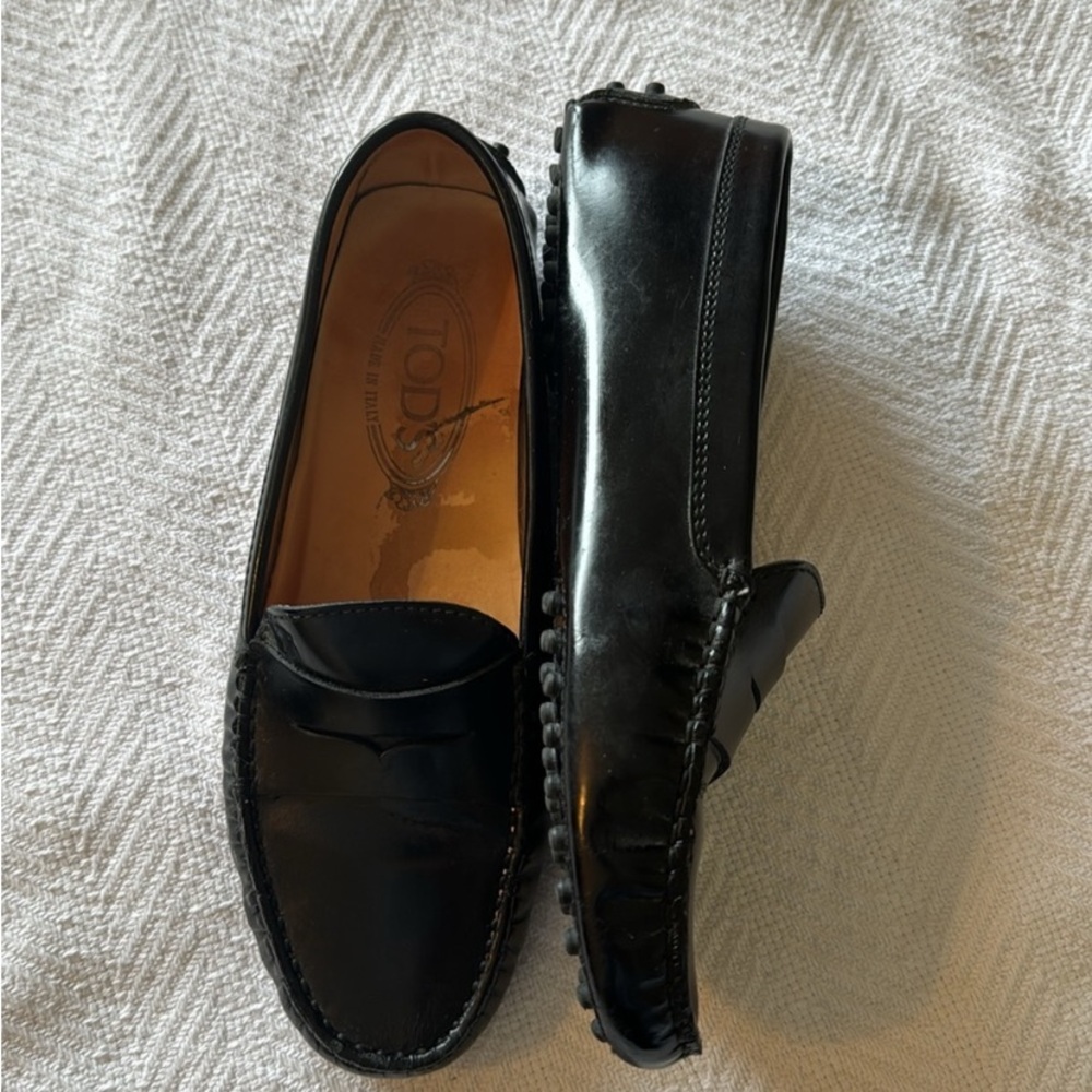 Tod’s Black Gommino Penny Loafers